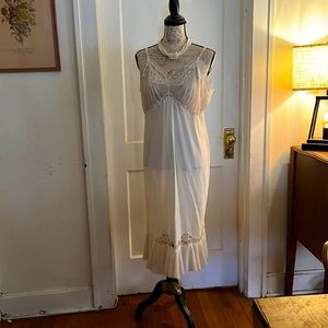 Vintage. Sheer, sexy, and lacy. Be bold and wear it as a summer chemise.